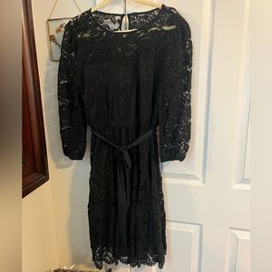 Vera Wang elegant black dress with lace detail. Great condition - only worn once